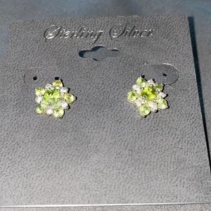 Dainty peridot earrings set in sterling silver.